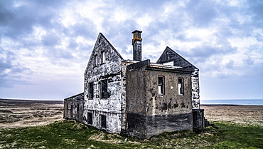 A worn out house in the SnÃ¦fellsnes peninsula of Iceland. Several of these houses exist, sometimes with a newer farm close by or in this case, alone, Iceland