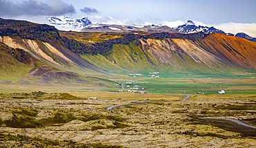 A beautiful long view across the colourful landscape of a valley from a tourist lookout, Iceland