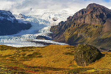 View of a large glacier and the mountains along the South coast of Iceland, part of the Vatnajokull ice cap, Iceland