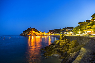 Night view from Tossa de Mar of Castell de Tossa, which was built in 1187, Tossa de Mar, Girona, Spain