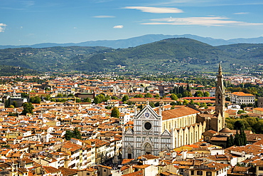 View over Florence with Santa Croce church and mountain range in the background, Florence, Tuscany, Italy