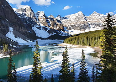 NoneSnow and ice on Moraine Lake with snow on the Rocky Mountains near Lake Louise, Banff National Park, Alberta, Canada