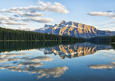 View of the back of Mount Rundle reflected in the water of Two Jack Lake, Banff National Park, Banff, Alberta, Canada