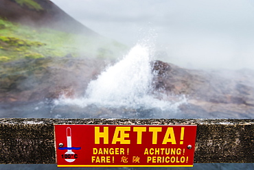 Warning sign in front of Europe's largest hot water spring, Kleppjarnsreykir, Iceland