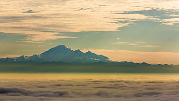 The peak of Mount Baker viewed from above the clouds, Vancouver, British Columbia, Canada