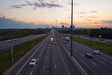 Highway 401 looking West towards Yonge Street at dusk, Toronto, Ontario, Canada