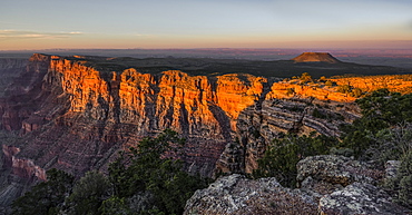 An extinct volcano near the edge of the Grand Canyon at sunset, Arizona, United States of America