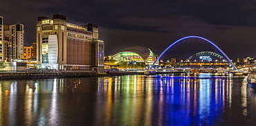 Reflections of Newcastle Gateshead quayside in the River Tyne, Gateshead, Tyne and Wear, England