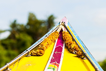 The front of a traditional Thai boat on the way to one of Bangkok's markets, Bangkok, Thailand