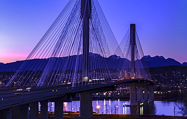 Port Mann Bridge at dusk, viewed from Surrey looking into Coquitlam, Surrey, British Columbia, Canada