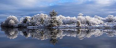 Snow lingers on a peaceful winter morning at Lewis and Clark National Historical Park, Astoria, Oregon, United States of America