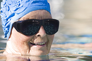 Portrait of a senior woman in a swimming pool