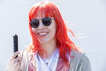 Young blind woman smiling with her cane