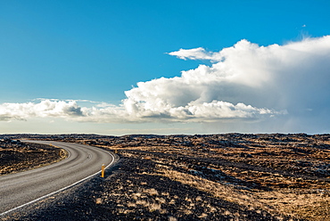 Volcanic landscape and curving road, Reykjanes Peninsula; Iceland