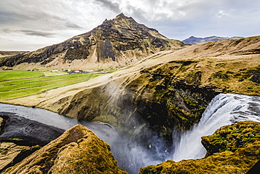 Skogafoss, a landmark waterfall, and Skoga River; Iceland