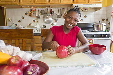 Teen suffering from Bipolar Disorder cutting fruit