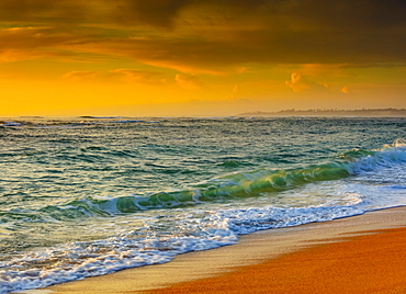 Sunrise over the Pacific Ocean and Lydgate Beach, Lydgate Park; Kapaa, Kauai, Hawaii, United States of America