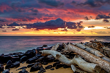 Sunrise over the Pacific Ocean from the shore of Lydgate Beach; Kapaa, Kauai, Hawaii, United States of America