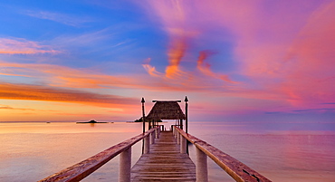 Pier off Malolo Island at sunrise into the South Pacific Ocean; Malolo Island, Fiji