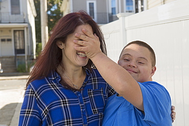 Teen who has Down Syndrome with his friend