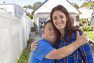 Teen who has Down Syndrome with his friend