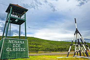 Display of Nenana Ice Classic tripod for 2016 and tower by Tanana River, Interior Alaska in summertime; Nenana, Alaska, United States of America