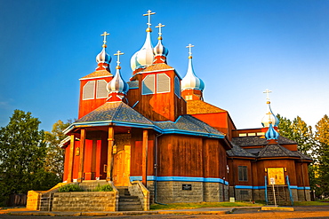 Sunset glow on St. Innocent Russian Orthodox Cathedral, South-central Alaska in summertime; Anchorage, Alaska, United States of America