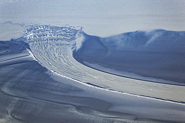 Aerial view of bore tide coming into Turnagain Arm of Cook Inlet, South-central Alaska; Hope, Alaska, United States of America