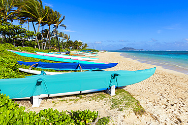 Lanikai Beach and kayaks on the white sand; Oahu, Hawaii, United States of America