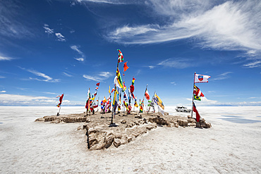 Flags of countries participating in the Bolivia Dakar Rally on Salar de Uyuni, the world's largest salt flat; Potosi Department, Bolivia