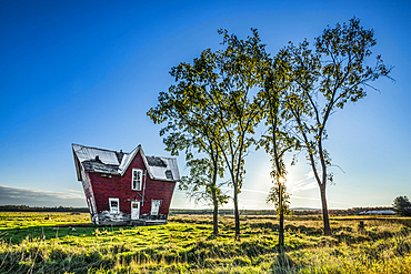 Fun house on the prairies with blue sky, near Sault St. Marie; Ontario, Canada