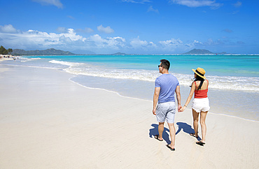 An Asian couple enjoying a vacation at Kailua Beach Park: Kailua, Oahu, Hawaii, United States of America