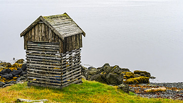 Wooden structure at the edge of Steingrimsfjorour, in Drangsnes, a small town in the Western part of Iceland; Iceland