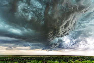 Supercell thunderstorm clouds show off the power of mother nature. Massive clouds build and unleash powerful storms creating a beautiful and awe inspiring spectacle; Colorado, United States of America