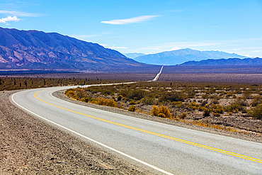 Road going through the arid and mountainous landscape of Los Cardones National Park; Salta Province, Argentina