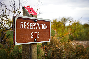 Reservation sign at campground, Oliver Lee Memorial State Park; Alamogordo, New Mexico, United States of America