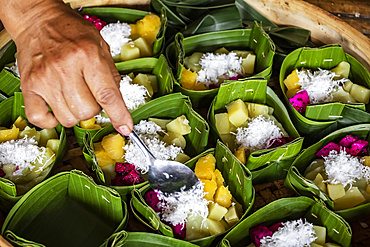 Fruit salad served in a banana leaf; Pedawa, Bali, Indonesia