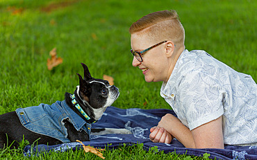 An owner delighting in a recovery dog, whose days are numbered; North Vancouver, British Columbia, Canada