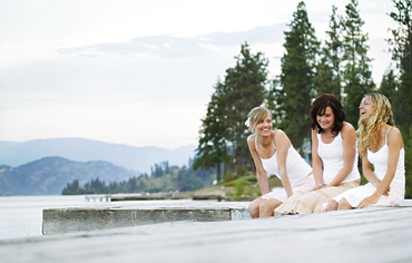 Three Women Enjoy A Laugh