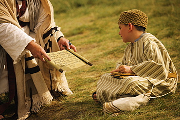 Young Boy In Bible Times Studying