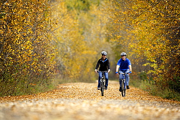 Man And Woman Biking