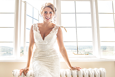 A bride in her bridal suite prior to her wedding