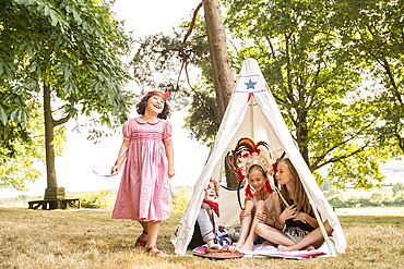 Young children play games in the sunshine