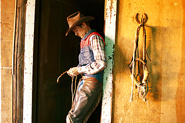 A cowboy braids a lariat, Cassoday, Kansas, United States of America