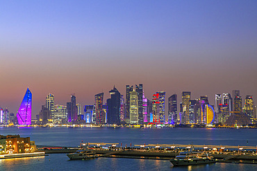 The skyline of the capital city of Doha and Business District at nightfall, Doha, Qatar