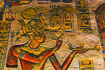 Bas-relief painted on the walls of the royal tomb of Rameses III Valley of the Kings, Thebes, Egypt