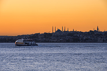 View of the Blue Mosque and Hagia Sophia at sunset from Kadikoy in Istanbul, Istanbul, Turkey