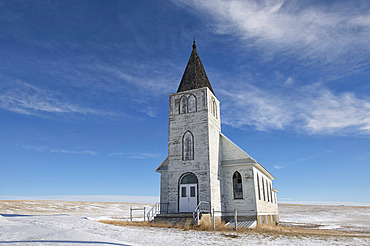 Abandoned church in the Canadian prairies on a harsh winter landscape, Admiral, Saskatchewan, Canada