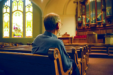 Organ manufacturer in a church with one of his company's organs, Lincoln, Nebraska, United States of America