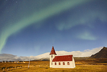 Northern Lights over a church in Hellnar, Snaefellsnes peninsula, west coast of Iceland, Hellnar, Iceland